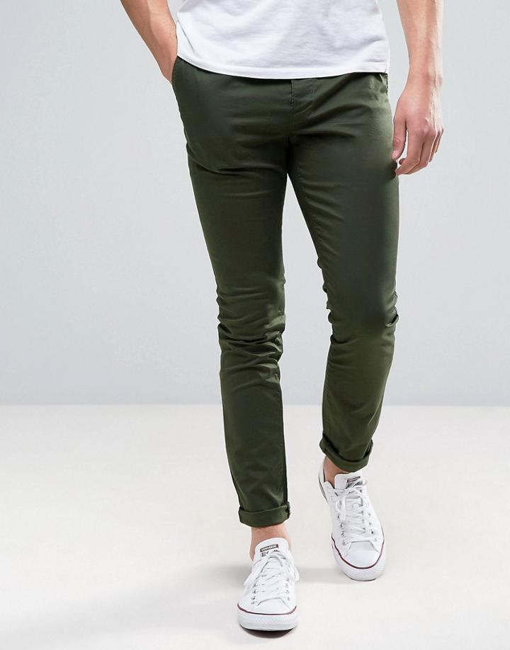 Asos Design Skinny Chinos In Dark Khaki-green