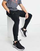 Under Armour Rush Slim Sweatpants In Black