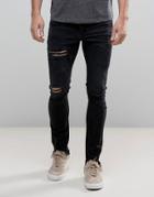 Asos Super Skinny Jeans In Washed Black With Heavy Rips And Hem Detail - Black