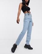 The Ragged Priest Mom Jeans With Bum Rip In Light Wash Denim
