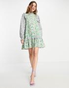 Envii Organic Cotton High Neck Mini Dress With Ruffle Details In Patchwork Floral-green