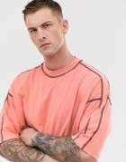 Asos Design Oversized T-shirt With Half Sleeve And Contrast Stitching In Acid Wash In Orange - Orange