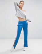 Asos Track Pants With Contrast Stripe And Zip Hem - Blue