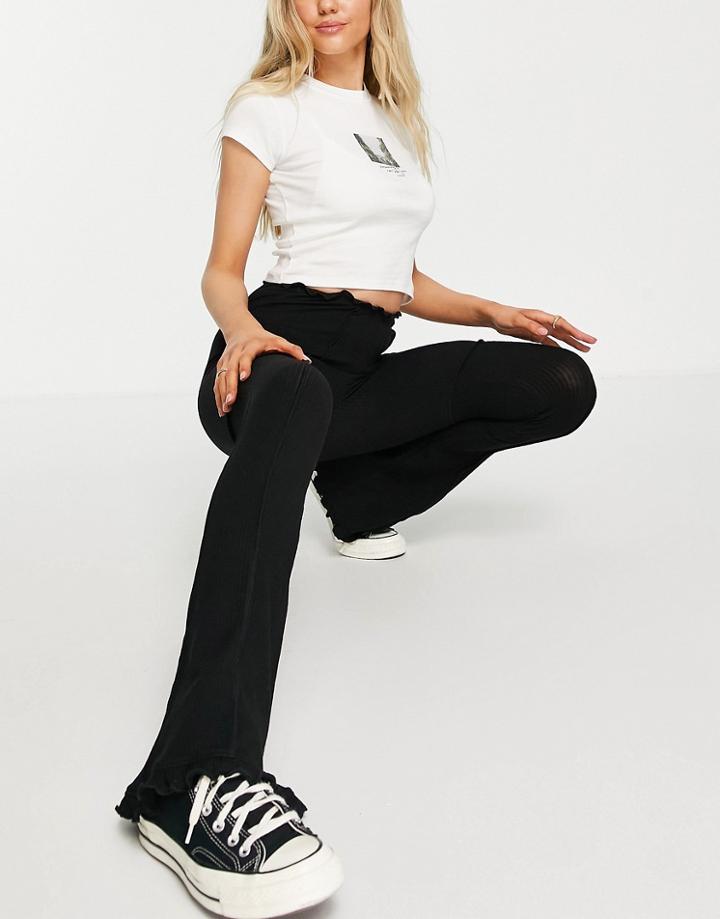 Topshop Patchwork Seam Flared Pants With Ruffle Detail In Black