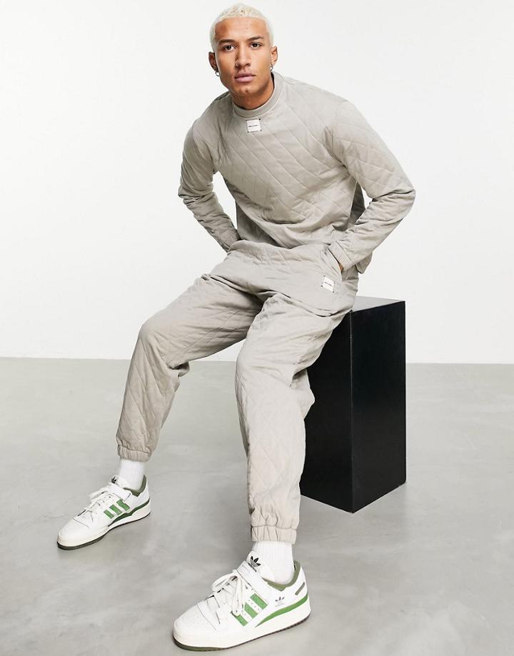 Asos Unrvlld Spply Relaxed Quilted Sweatpants With Logo Tab - Part Of A Set-brown