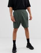 Asos Design Slim Shorts With Asymmetric Front In Dark Green - Green