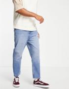 Asos Design Organic Cotton Blend Relaxed Tapered Jeans In Vintage Mid Wash-blues