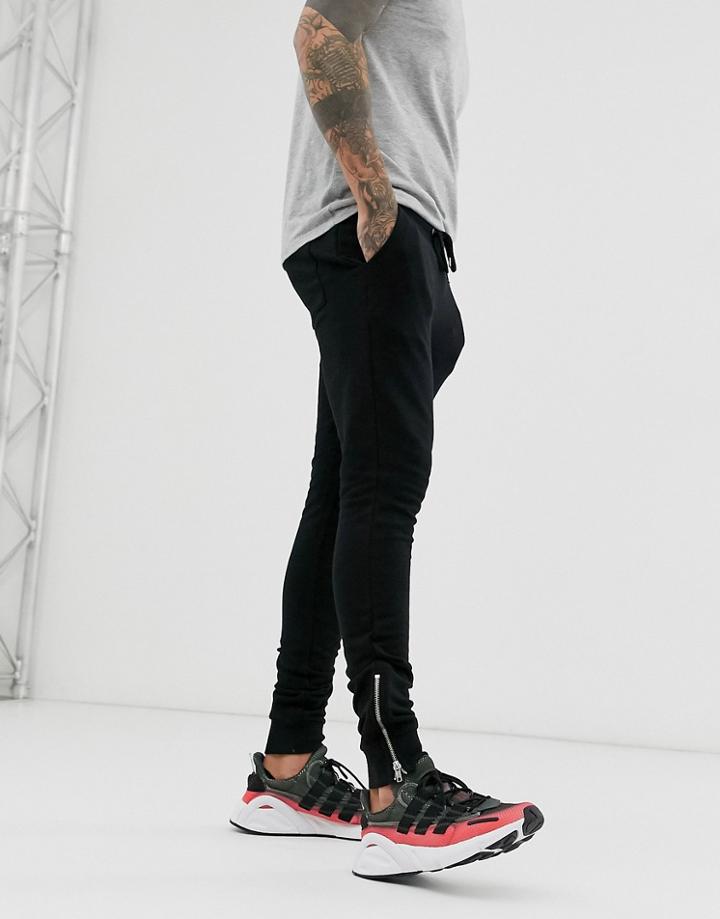 Asos Design Super Skinny Sweatpants In Black With Silver Zip Cuffs