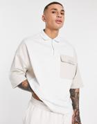 Asos Unrvlld Spply Oversized Half Zip Polo With Cut & Sew And Logo Print-neutral