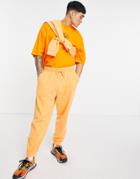 Asos Design Organic Matching Oversized Sweatpants In Orange Vintage Wash