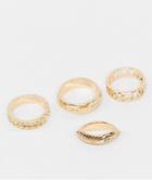 Asos Design Pack Of 4 Rings In Mixed Texture And Cut-out Roman Numerals In Gold Tone