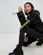Cheap Monday Cropped Anorak With Multi Pockets And Logo Taping - Black