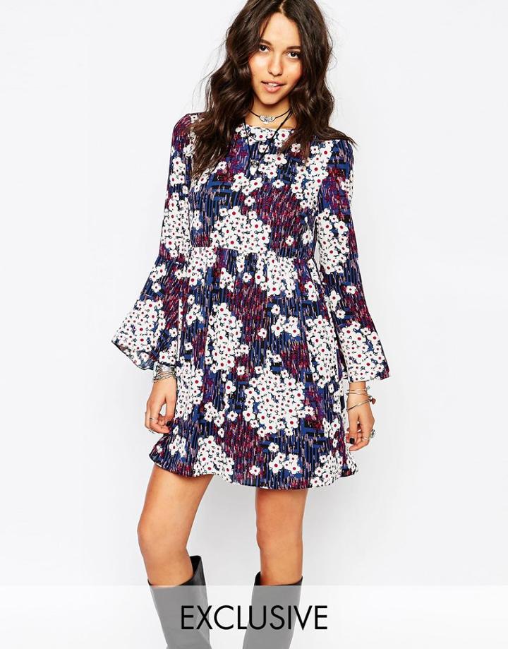 Reclaimed Vintage Dress With Bell Sleeves & Frill Bottom In Ditsy Floral Print - Blue