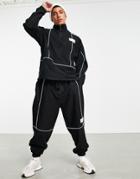 Asos Unrvlld Spply Oversized Polar Fleece Sweatpants With Piping And Logo Tab - Part Of A Set-black