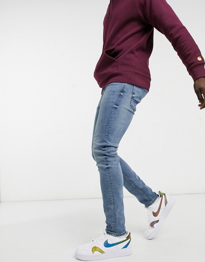 Asos Design Skinny Jeans In Mid Wash Blue-blues