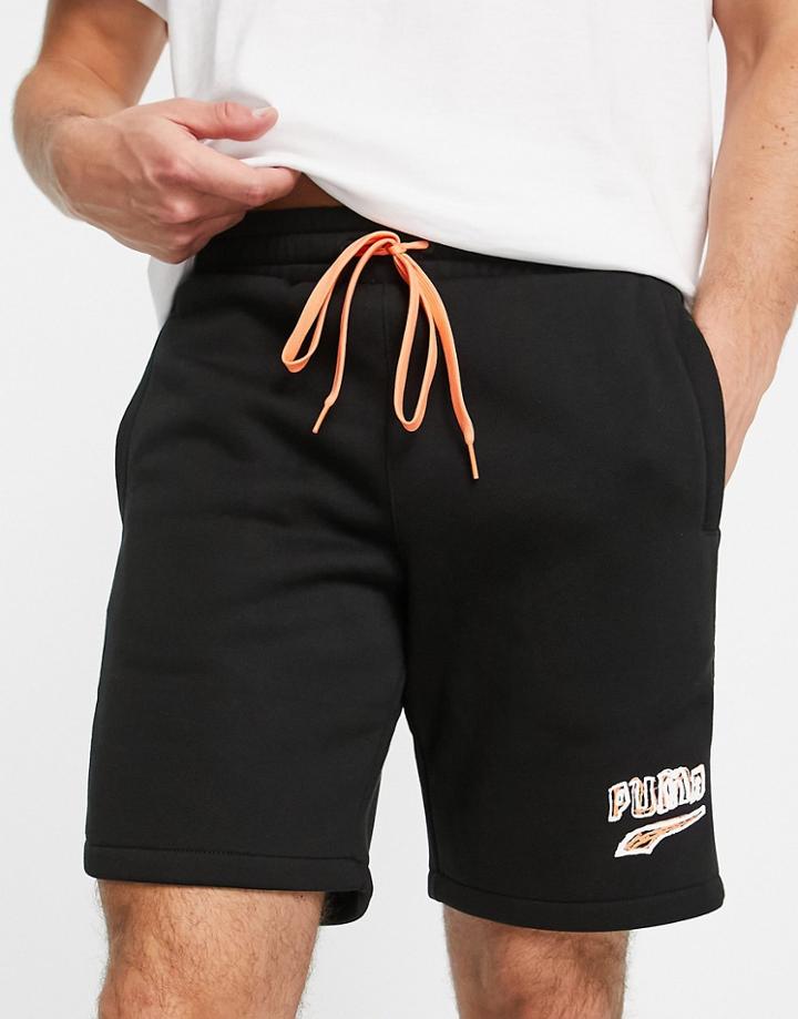 Puma Logo Jersey Shorts In Black And Orange