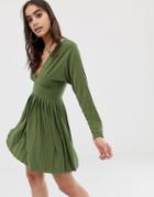 Asos Design Jersey Crepe V Neck Mini Dress With Pleated Skirt - Green