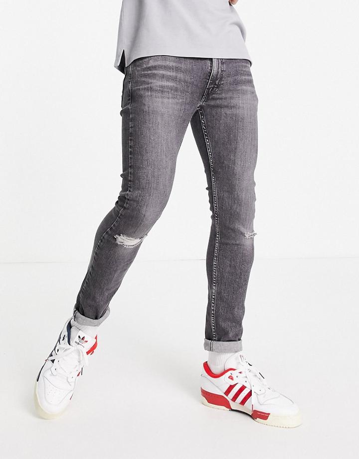 Levi's 519 Super Skinny Fit Distressed Hi-ball Jeans In Washed Black