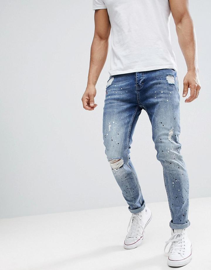 Stradivarius Slim Tapered Jeans With Paint Splat In Mid Blue - Blue