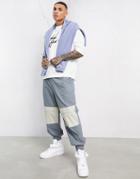 Asos Dark Future Oversized Tapered Pants With Contrast Panels And Embroidery-blues