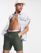Asos Design Slim Shorts In Dark Green Seersucker