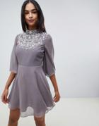 Asos Design Mini Dress With Flutter Cape And Pretty Pearl Embellishment-purple