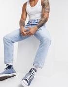 Asos Design Relaxed Tapered Jeans In Light Blue Stone Wash