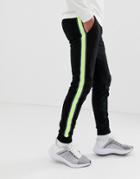 Asos Design Skinny Joggers With Neon Side Stripe Taping In Black - Black