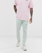 Asos Design Skinny Pants With Elastic Waist In Light Green Nylon