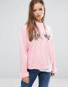 Stylenanda Crew Neck Sweatshirt With Frill Sleeves And Sequin Swallow
