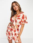 Monki Relaxed Romper With Tie Front And Frill Sleeves In Poppy Print-multi