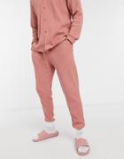 Asos Design Tapered Sweatpants With Fixed Hem In Pink Waffle