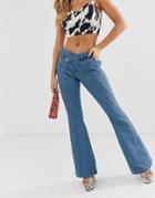 Asos Design Full Length Flare Jeans With Wrap Waist Band And Cut About Seam Detail In Mid Green Blue Wash - Blue