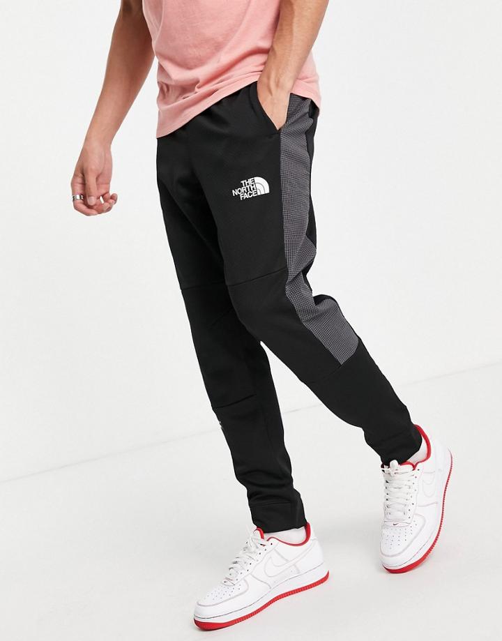 The North Face Mountain Athletic Cuffed Sweatpants In Black