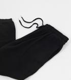 Asos Design Curve Supersoft Slim Leg Sweatpants In Black