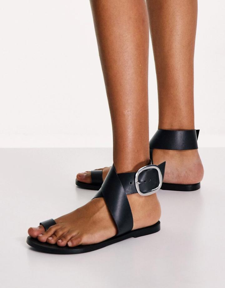 Asos Design Flyer Leather Toe Loop Flat Sandals In Black