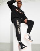 Asos Unrvlld Spply Relaxed Sweatpants With Logo Leg Print In Black - Part Of A Set