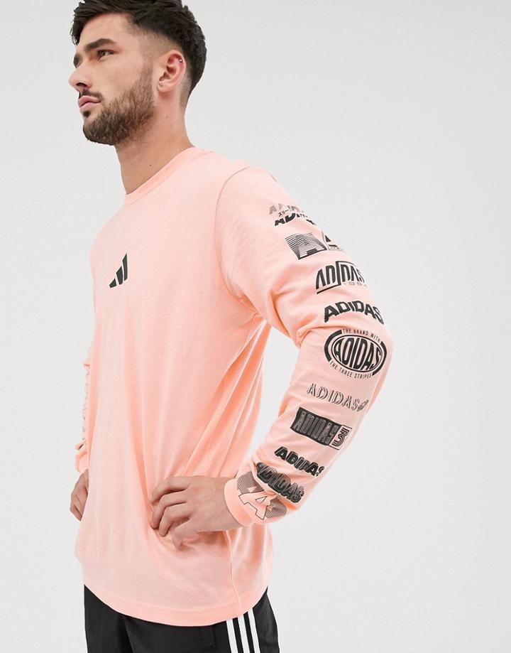 Adidas Performance 'the Pack' Graphic Print Long Sleeve T-shirt In Pink - Pink