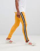 Asos Design Retro Track Super Skinny Joggers With Side Stripe - Yellow