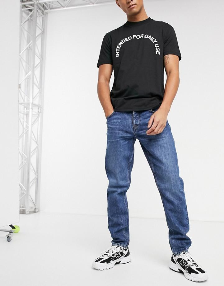 Asos Design Slim Jeans In Vintage Mid Blue