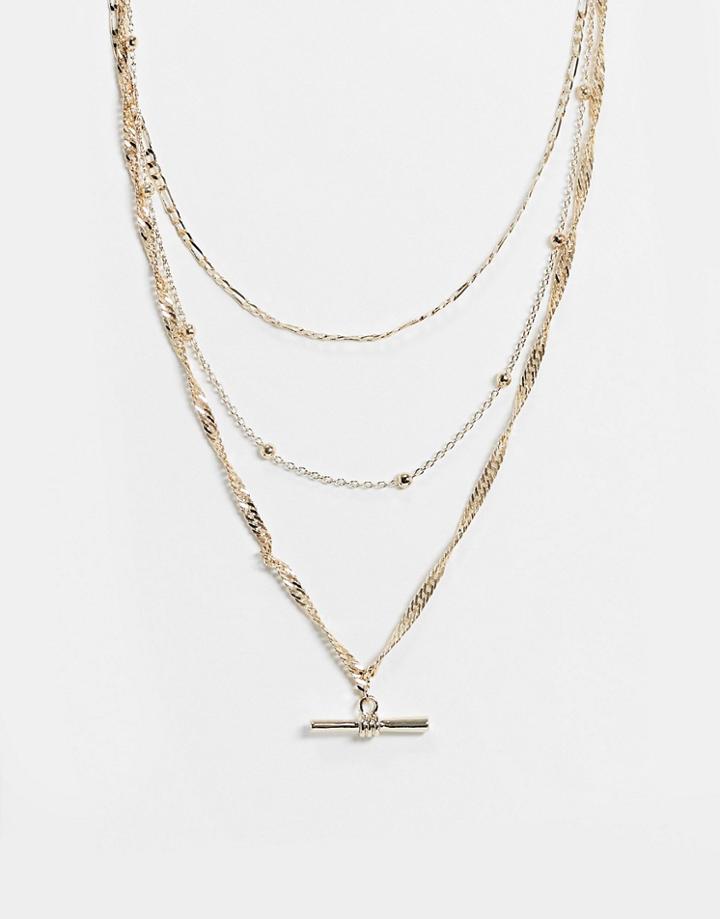 Asos Design Multirow Necklace With Mixed Chain And T Bar Pendant In Gold Tone