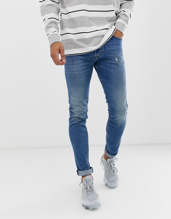 Diesel Tepphar Slim Carrot Fit Jeans In 089aw Medium Wash - Blue