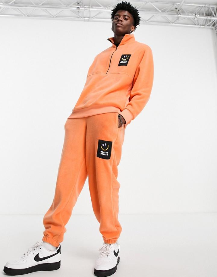 Crooked Tongues Fleece Sweatpants In Orange - Part Of A Set