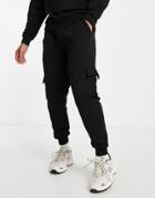 Asos Design Tapered Sweatpants With Pocket Details In Black - Part Of A Set