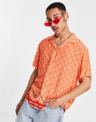Asos Design Relaxed Revere Shirt In Orange Paisley Print With Hem Border