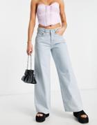 The Ragged Priest Low Rise Wide Leg Skater Jeans In Stone Wash Denim-blue