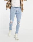 Asos Design Spray On 'vintage Look' Jeans With Powerstretch In Light Wash With Knee Rips-blues