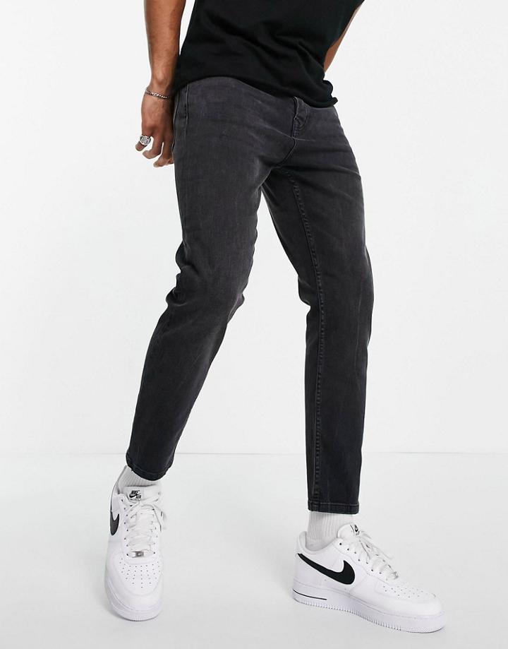 Topman Stretch Tapered Jeans In Washed Black