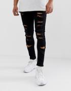 Asos Design Spray On Jeans In Power Stretch With Heavy Rips In Black - Black