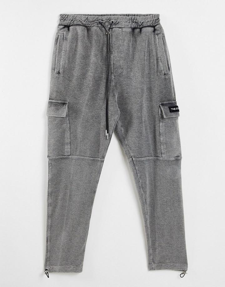 The Couture Club Reverse Loopback Cargo Pants In Black Acid Wash